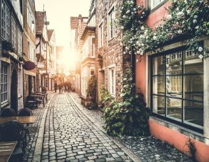 Old town in Europe at sunset with retro vintage Instagram style